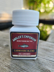 Fishing bait mix container labeled 'Angler's Emporium' on a wooden surface.