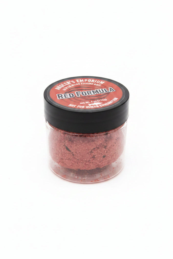 red micro fishing bait in jar