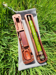 green bamboo telescopic fishing rod on grass