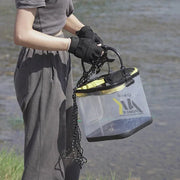 woman holding clear fish box