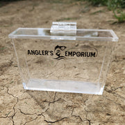 Clear acrylic block with 'Angler's Emporium' logo on a textured stone background