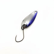 Metallic fishing lure on a white background
