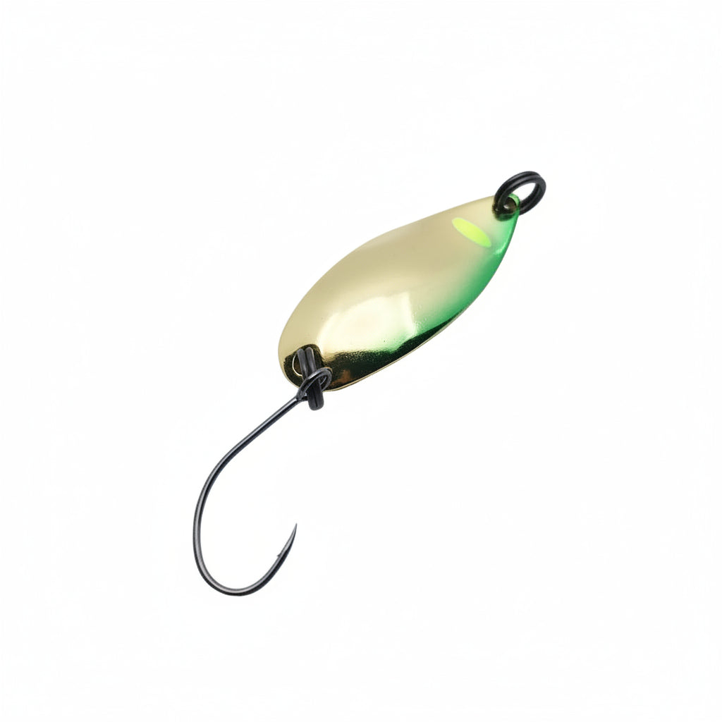 gold fishing spoon on white background