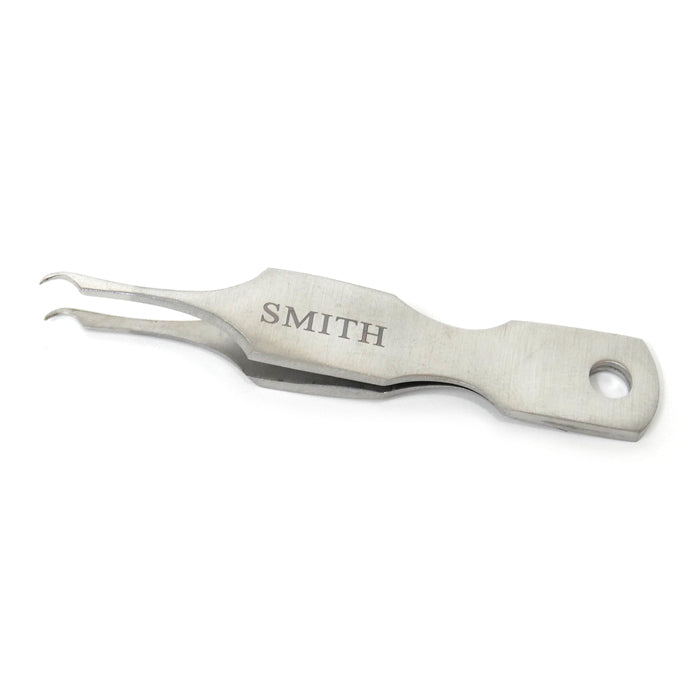 Metal tool with 'SMITH' engraving on a white background