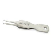 Metal tool with 'SMITH' engraving on a white background