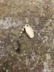 swiss swing lure with single hook and built in swivel to eliminate line twist